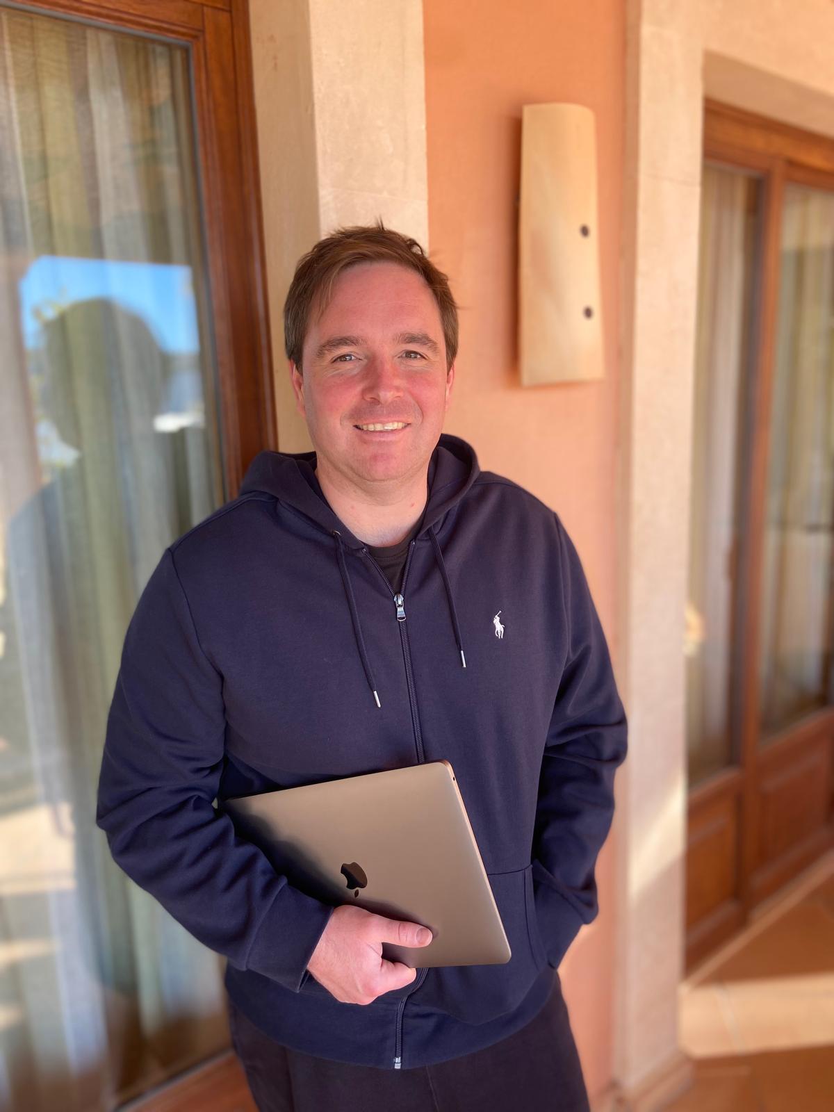 Vincent, The Self Employed Coach, with laptop